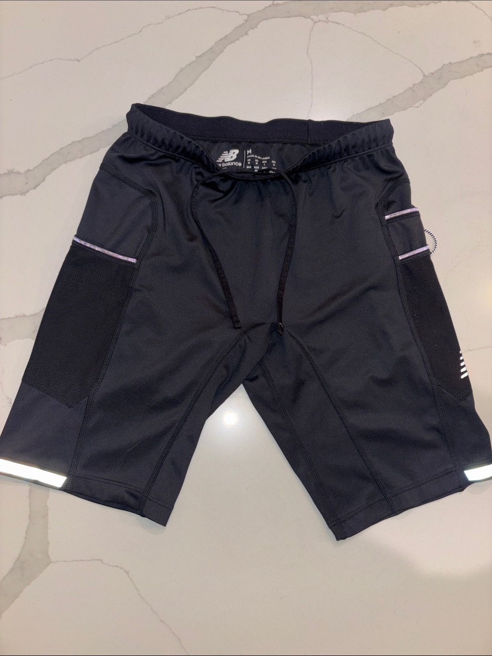 New Balance Men’s Black Athletic Shorts with Reflective Trim